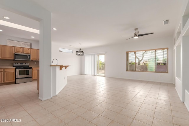 interior space featuring light tile patterned floors, visible vents, and recessed lighting