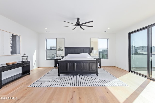 bedroom featuring ceiling fan, access to exterior, and light wood-type flooring