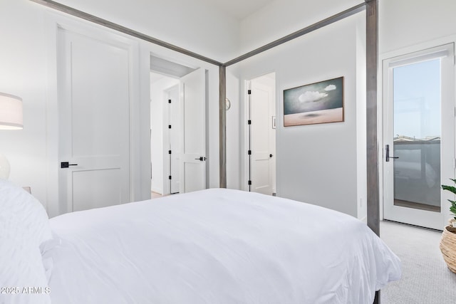 bedroom with light colored carpet