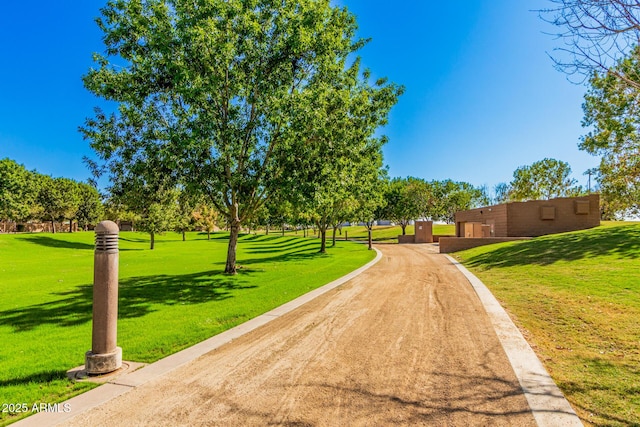 surrounding community featuring a lawn