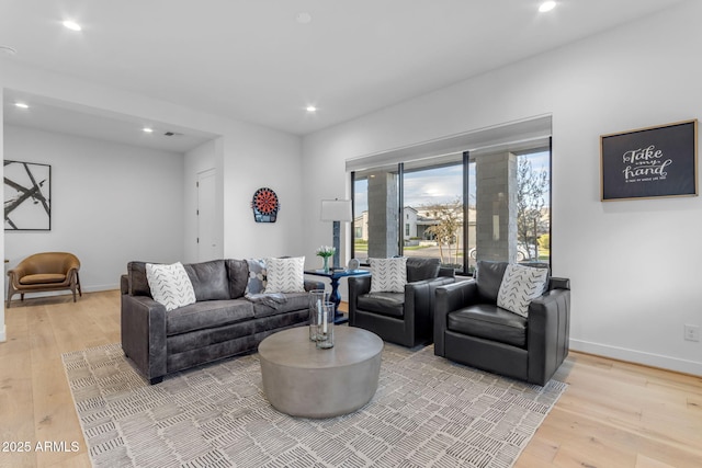 living room with light hardwood / wood-style floors