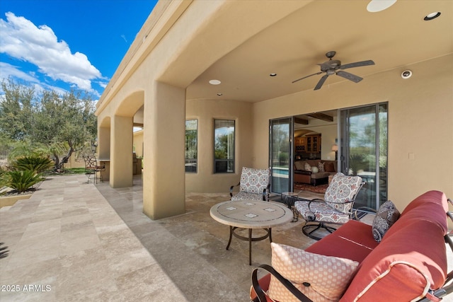 view of patio / terrace featuring ceiling fan and an outdoor hangout area