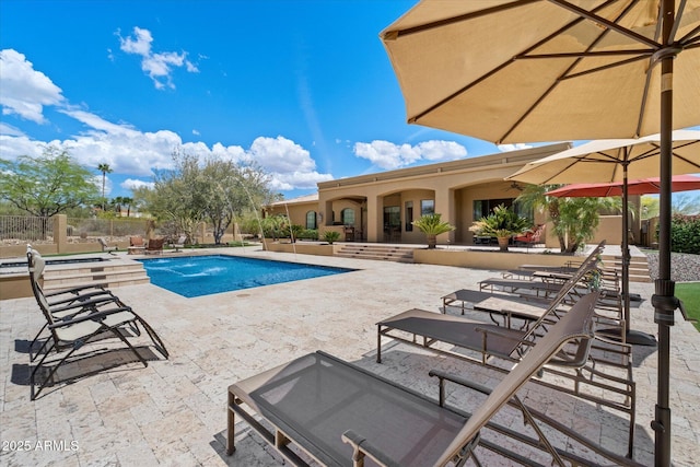 view of pool featuring a patio, fence, and a fenced in pool