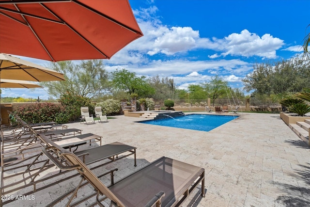 view of pool featuring a fenced in pool, fence, and a patio area