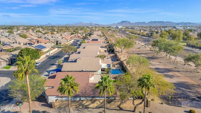 aerial view featuring a mountain view and a residential view