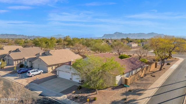 drone / aerial view with a mountain view and a residential view