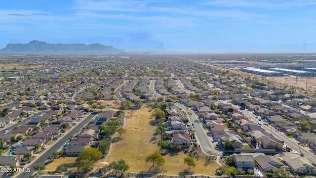 birds eye view of property with a mountain view and a residential view