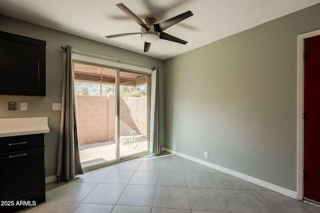 interior space with ceiling fan