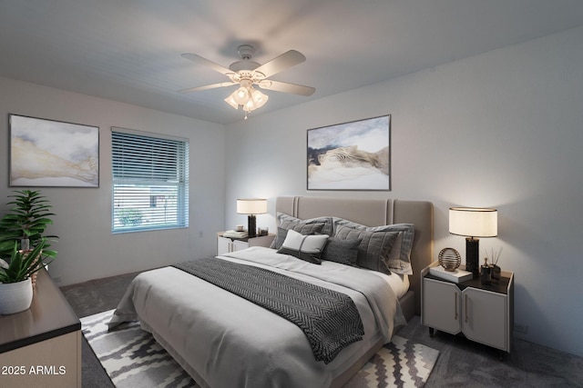 bedroom with dark colored carpet and ceiling fan