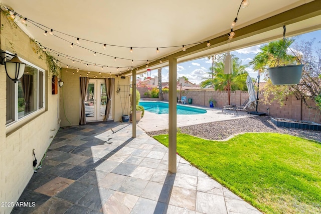 view of patio with a fenced backyard and a fenced in pool