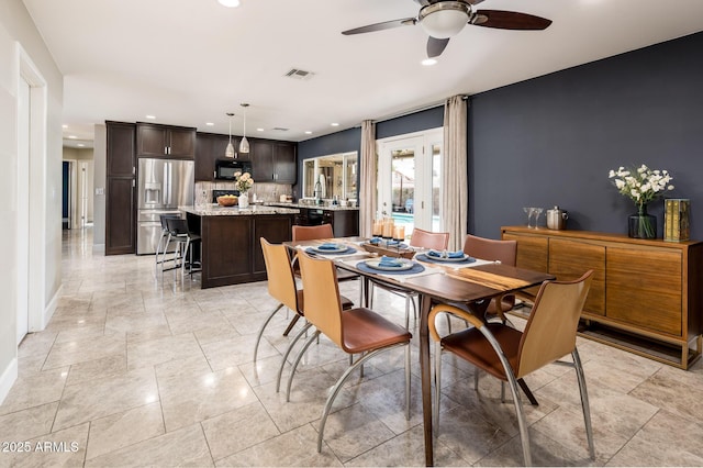 dining room featuring a ceiling fan, recessed lighting, visible vents, and baseboards