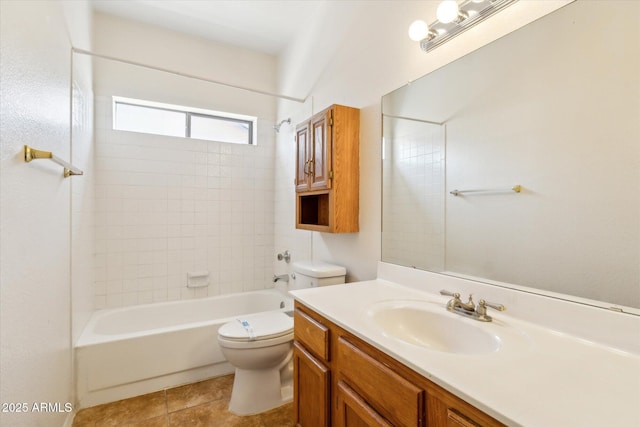 bathroom featuring toilet, shower / bathing tub combination, and vanity
