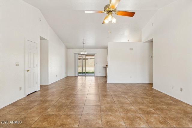 spare room with tile patterned flooring, high vaulted ceiling, and ceiling fan with notable chandelier