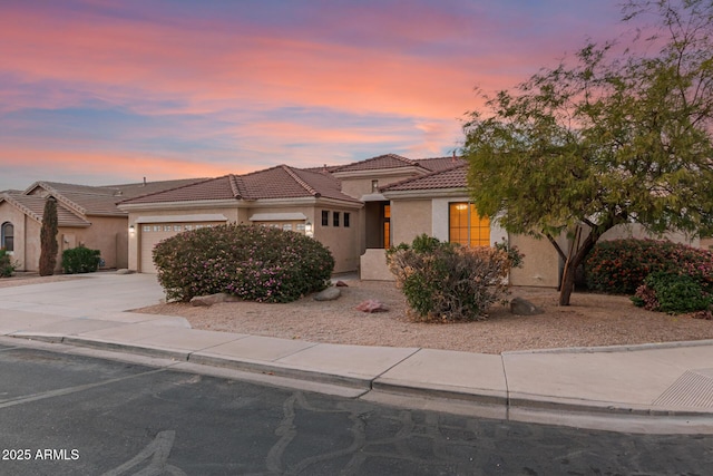 view of front of property featuring a garage