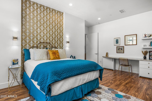 11649 N Miller Rd, Scottsdale, AZ 85260 - bedroom featuring built in desk, recessed lighting, baseboards, visible vents, and wood finished floors
