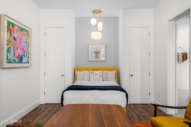 11649 N Miller Rd, Scottsdale, AZ 85260 - bedroom with baseboards and wood finished floors