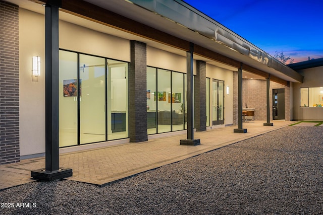 11649 N Miller Rd, Scottsdale, AZ 85260 - rear view of house featuring a patio and brick siding