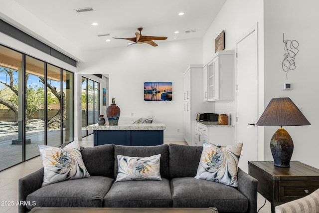 11649 N Miller Rd, Scottsdale, AZ 85260 - living area with ceiling fan, visible vents, recessed lighting, and light tile patterned floors