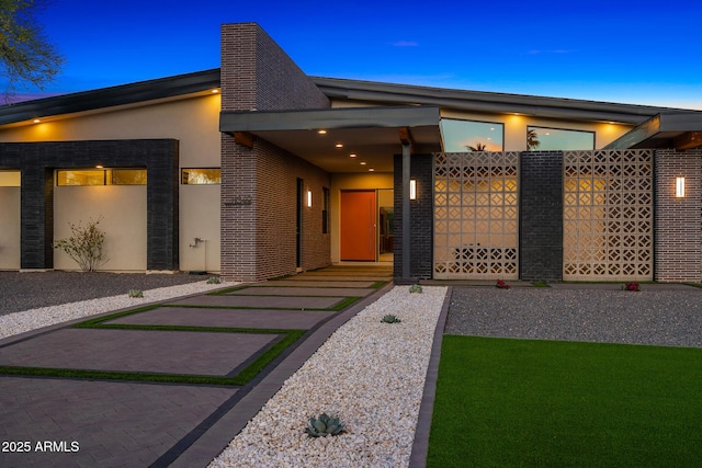 11649 N Miller Rd, Scottsdale, AZ 85260 - view of front of home featuring brick siding and stucco siding