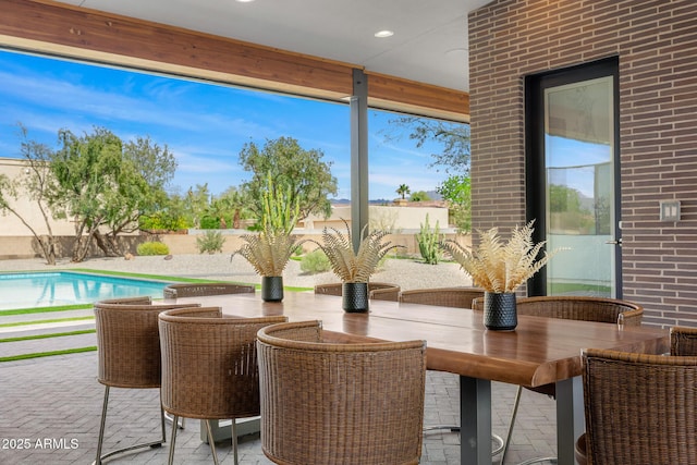 11649 N Miller Rd, Scottsdale, AZ 85260 - view of patio featuring a fenced backyard, outdoor dining area, and a fenced in pool