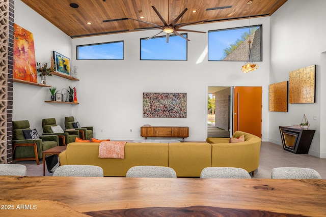 11649 N Miller Rd, Scottsdale, AZ 85260 - living room with baseboards, a towering ceiling, recessed lighting, a ceiling fan, and wood ceiling