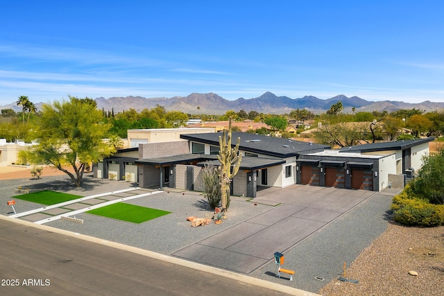 11649 N Miller Rd, Scottsdale, AZ 85260 - view of front facade featuring driveway, a garage, and a mountain view