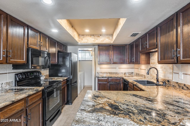 8225 N Central Ave Unit 44, Phoenix, AZ 85020 - kitchen featuring backsplash, a sink, light tile patterned floors, light stone counters, and black appliances