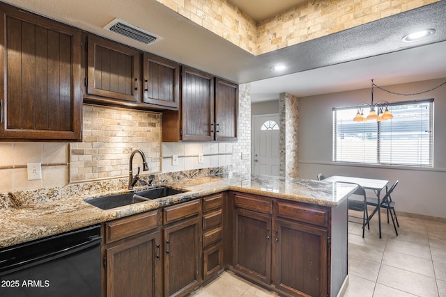 8225 N Central Ave Unit 44, Phoenix, AZ 85020 - kitchen with visible vents, decorative backsplash, a peninsula, a sink, and dishwasher