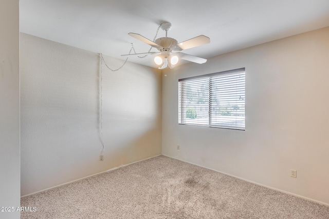 8225 N Central Ave Unit 44, Phoenix, AZ 85020 - spare room featuring baseboards, carpet flooring, and a ceiling fan