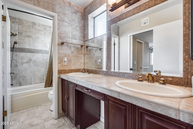 8225 N Central Ave Unit 44, Phoenix, AZ 85020 - bathroom featuring a sink, toilet, double vanity, and visible vents
