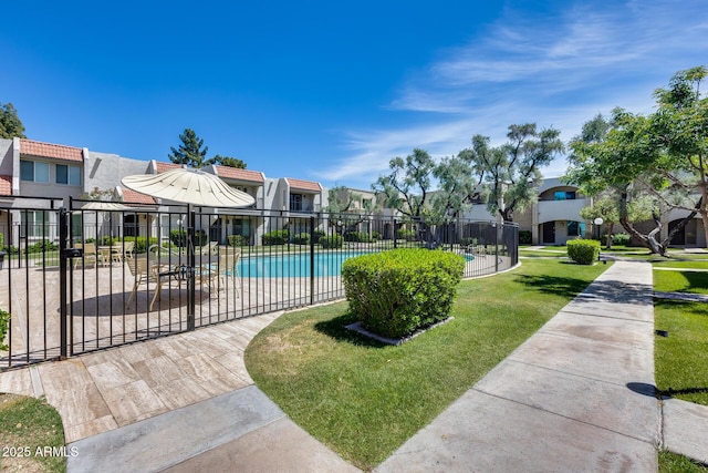 8225 N Central Ave Unit 44, Phoenix, AZ 85020 - surrounding community with a lawn, a swimming pool, fence, and a residential view