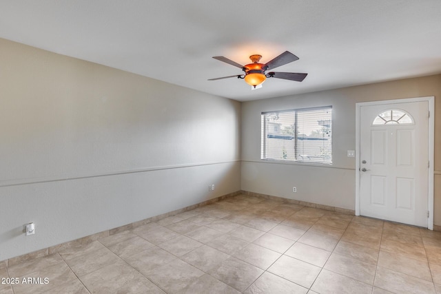 8225 N Central Ave Unit 44, Phoenix, AZ 85020 - entryway featuring light tile patterned flooring, ceiling fan, and baseboards