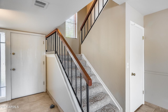 8225 N Central Ave Unit 44, Phoenix, AZ 85020 - staircase with tile patterned floors and visible vents