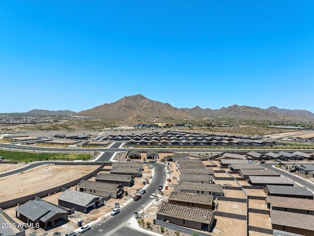 birds eye view of property featuring a mountain view and a residential view