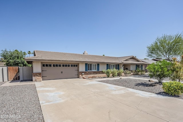 2178 E Golf Ave, Tempe, AZ 85282 - ranch-style house with brick siding, an attached garage, driveway, and a gate