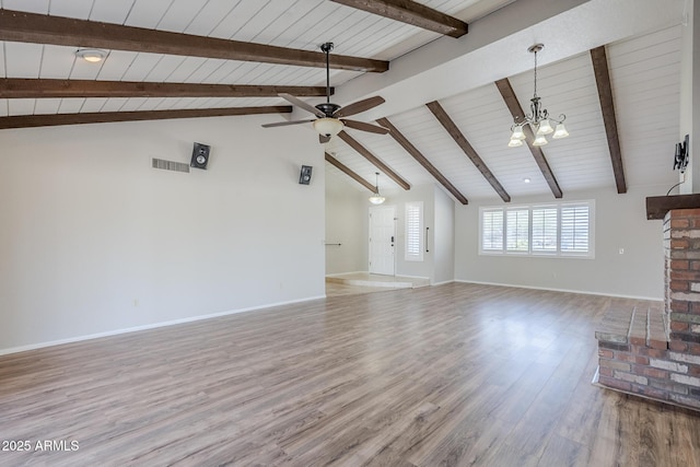 2178 E Golf Ave, Tempe, AZ 85282 - unfurnished living room featuring wood finished floors, a ceiling fan, wooden ceiling with exposed beams, baseboards, and a chandelier