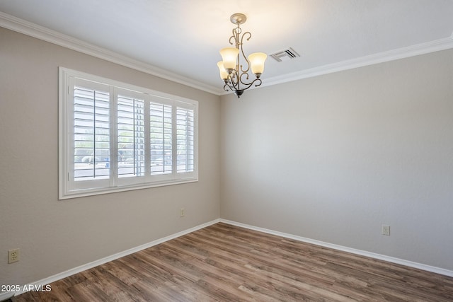 2178 E Golf Ave, Tempe, AZ 85282 - unfurnished room featuring a chandelier, wood finished floors, ornamental molding, and baseboards