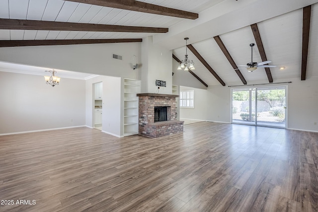 2178 E Golf Ave, Tempe, AZ 85282 - unfurnished living room featuring a chandelier, a fireplace, baseboards, a ceiling fan, and wood finished floors