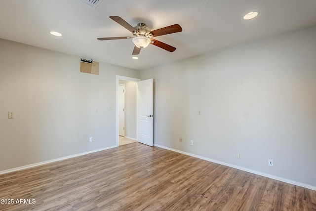 2178 E Golf Ave, Tempe, AZ 85282 - unfurnished room with light wood finished floors, ceiling fan, recessed lighting, and baseboards