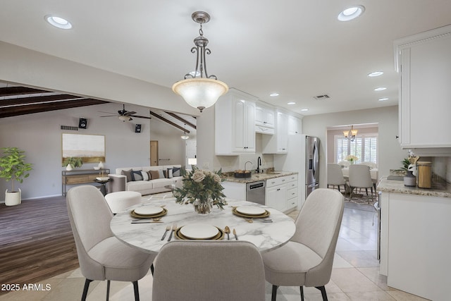 2178 E Golf Ave, Tempe, AZ 85282 - dining area with a chandelier, recessed lighting, ceiling fan, light tile patterned floors, and baseboards