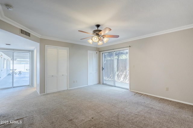 2178 E Golf Ave, Tempe, AZ 85282 - unfurnished bedroom with access to outside, ornamental molding, carpet flooring, baseboards, and multiple closets