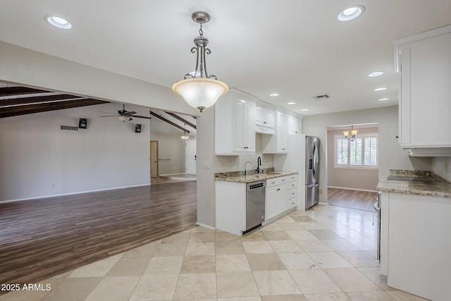 2178 E Golf Ave, Tempe, AZ 85282 - kitchen with appliances with stainless steel finishes, white cabinets, a chandelier, a ceiling fan, and recessed lighting