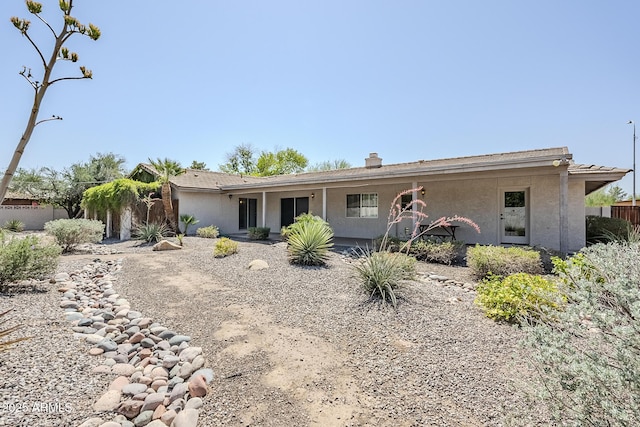 2178 E Golf Ave, Tempe, AZ 85282 - back of property with stucco siding and a chimney