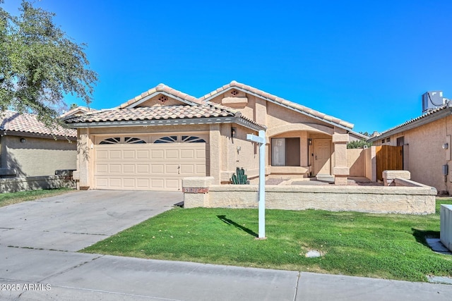 view of front facade featuring concrete driveway, a tiled roof, an attached garage, a front lawn, and stucco siding