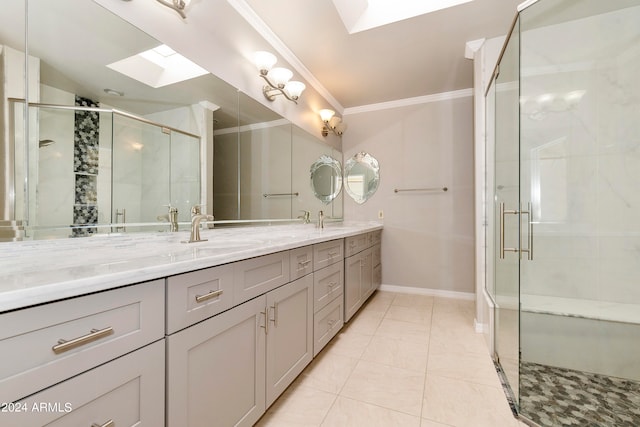 bathroom featuring vaulted ceiling with skylight, tile patterned flooring, walk in shower, ornamental molding, and vanity