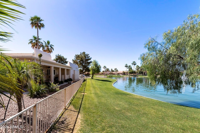 exterior space with a water view