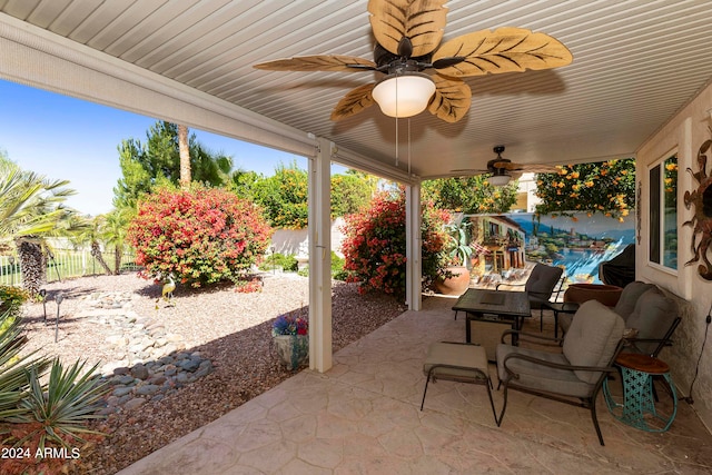 view of patio / terrace featuring ceiling fan