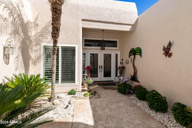 entrance to property featuring french doors