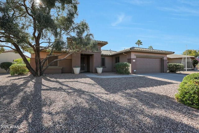 view of front of home with a garage