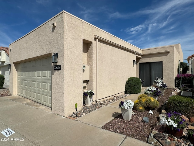 view of home's exterior featuring a garage